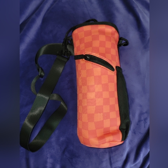RadRev Accessories - Rad Rev Orange Checkered Bottle Bag